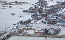 An aerial view of Minato, Japan, a week after a 9.0 magnitude earthquake and subsequent tsunami devastated the area. (U.S. Marine Corps photo by Lance Cpl. Ethan Johnson/Released)